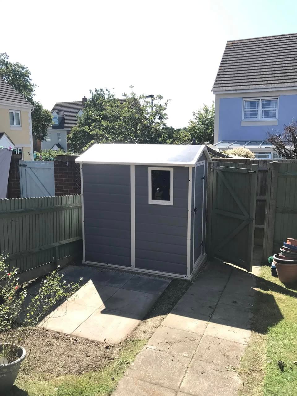 Garden shed installed on concrete slab base